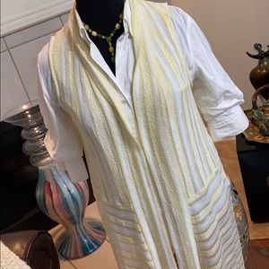 Draped in a chic, airy vest by JNY🎉